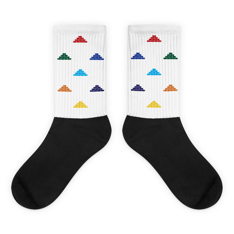 White and black socks with multi color build daily brick by brick logo