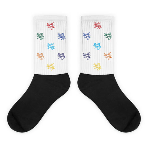 White and black socks with multi color build daily signature logo