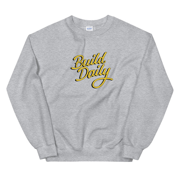 Grey crewneck sweatshirt with yellow and black build daily signature logo