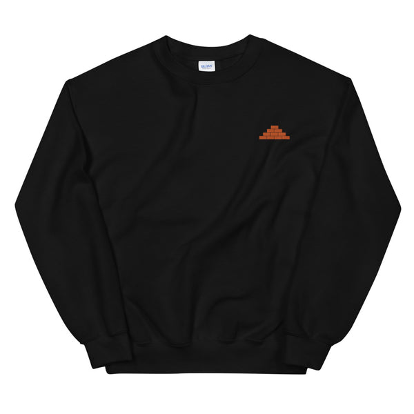 Black crewneck sweatshirt with orange build daily brick by brick logo