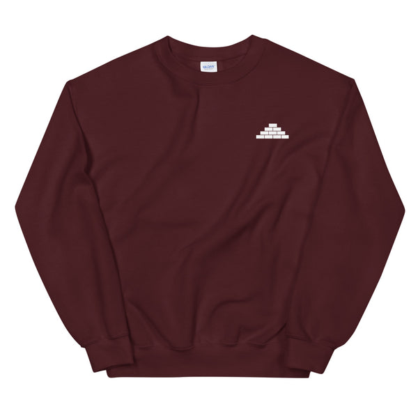 Maroon crewneck sweatshirt with white build daily brick by brick logo