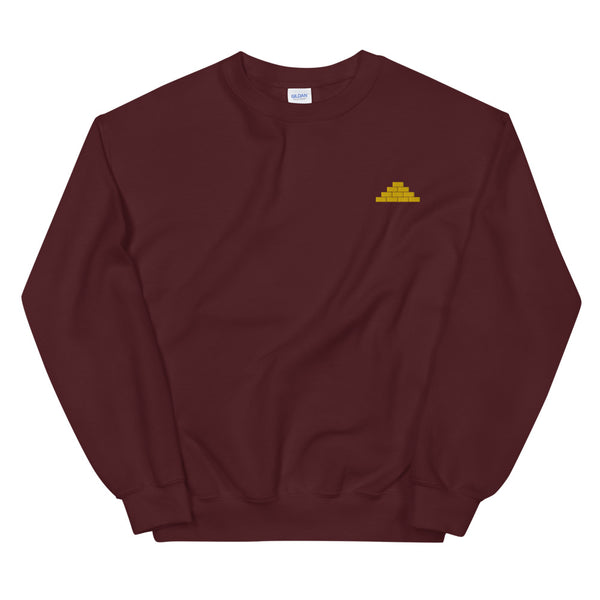 Maroon crewneck sweatshirt with yellow build daily brick by brick logo