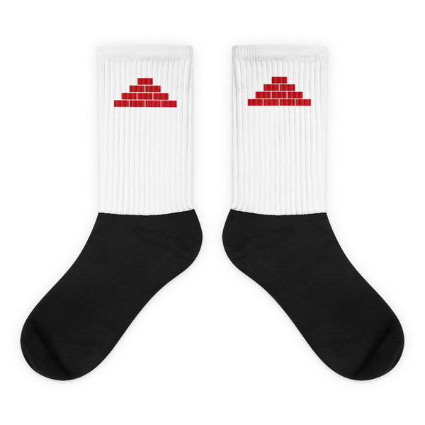 White and black socks with red build daily brick by brick logo