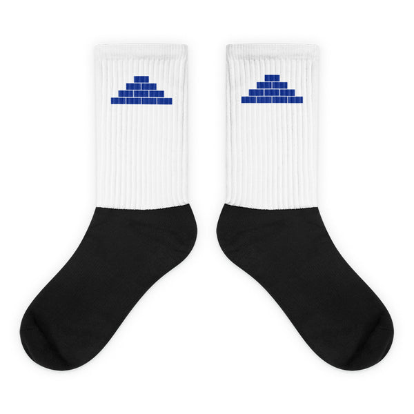 White and black socks with royal blue build daily brick by brick logo