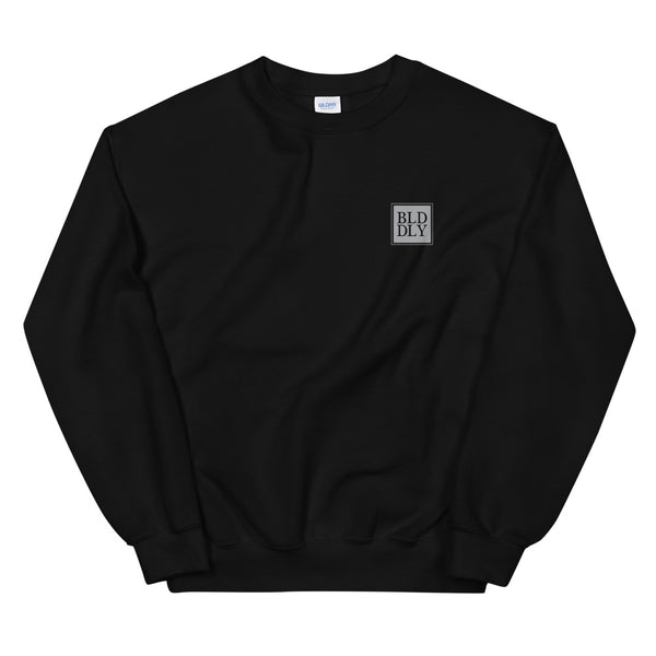 Black crewneck sweatshirt with grey build daily monogram logo