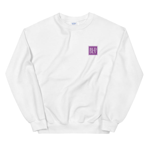 White crewneck sweatshirt with purple build daily monogram logo
