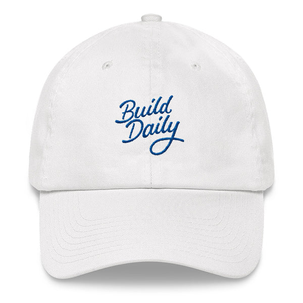 White cap with royal blue build daily signature logo