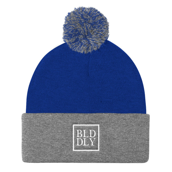 Royal blue and grey beanie with white build daily monogram logo