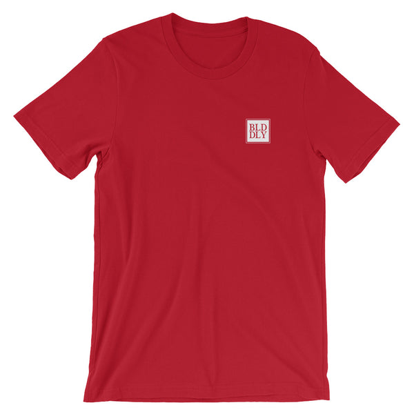 Red t shirt with white build daily monogram logo