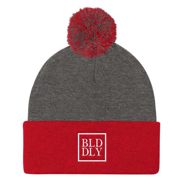 Grey and red beanie with white build daily monogram logo