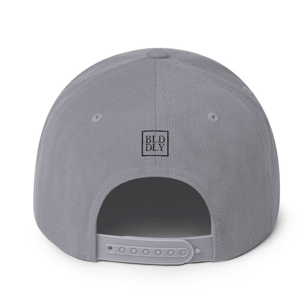 Back of grey cap with black build daily monogram logo