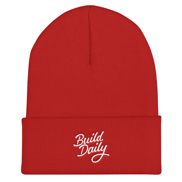 Red beanie with white build daily signature logo