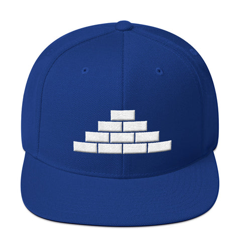 Royal blue cap with white build daily brick by brick logo