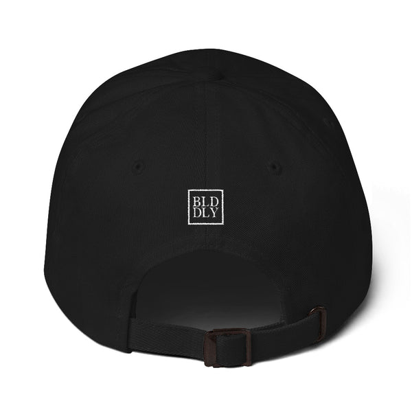 Back of black cap with white build daily monogram logo