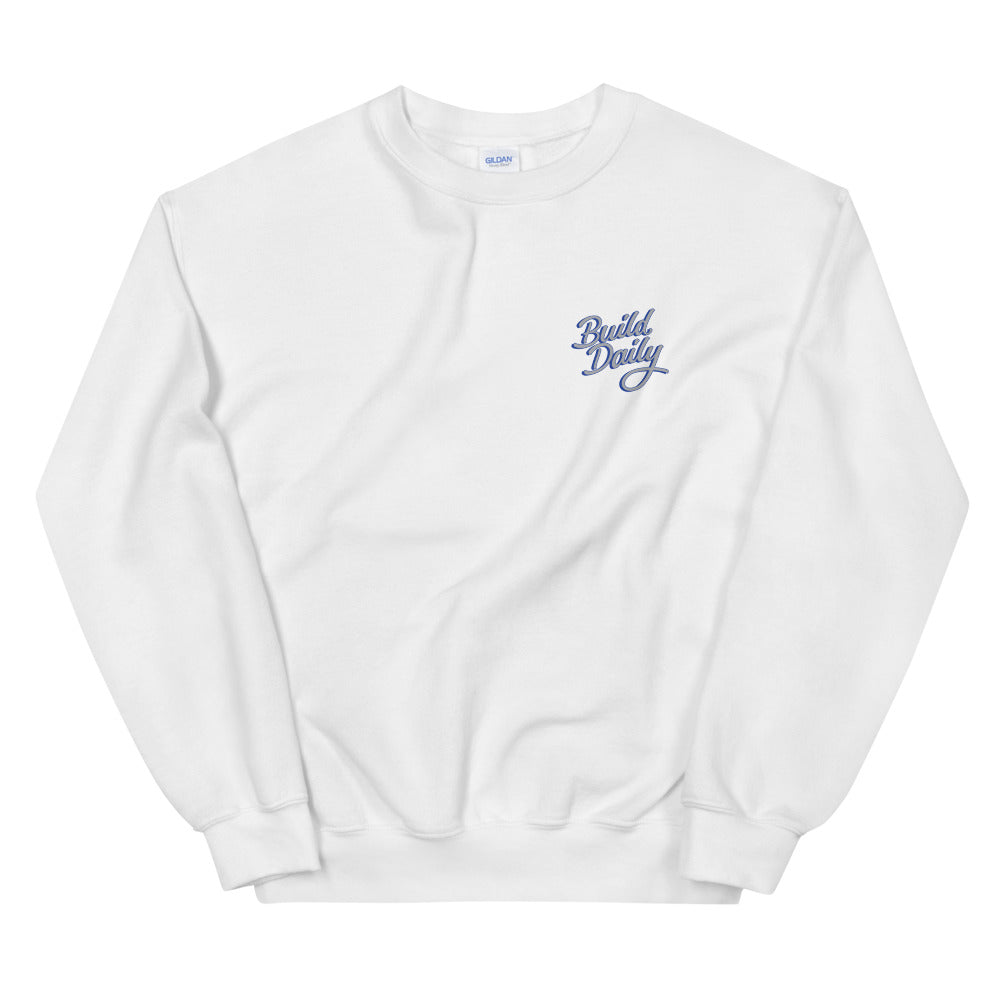 White crewneck sweatshirt with grey and royal blue build daily signature logo