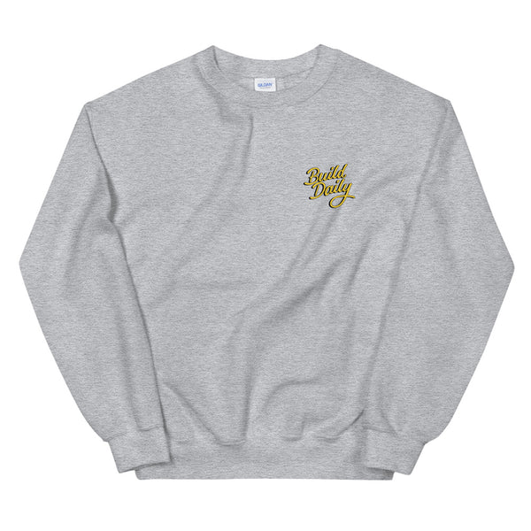 Grey crewneck sweatshirt with yellow and black build daily signature logo