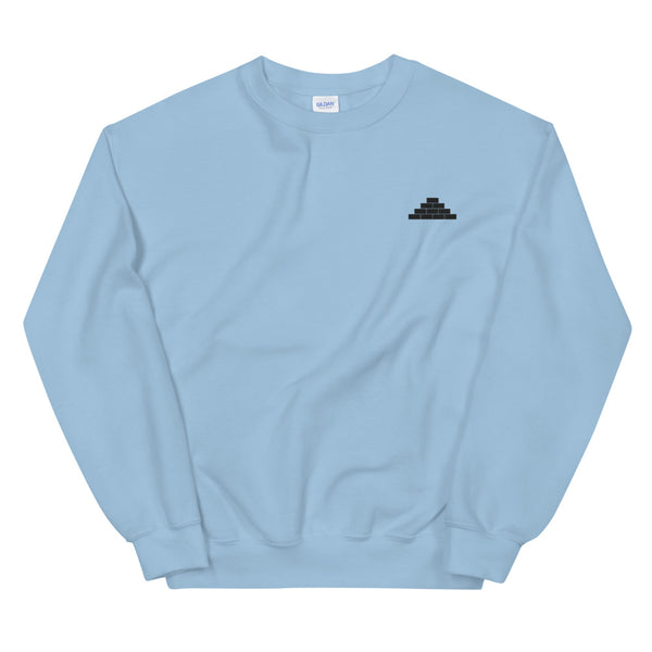 Light blue crewneck sweatshirt with black build daily brick by brick logo