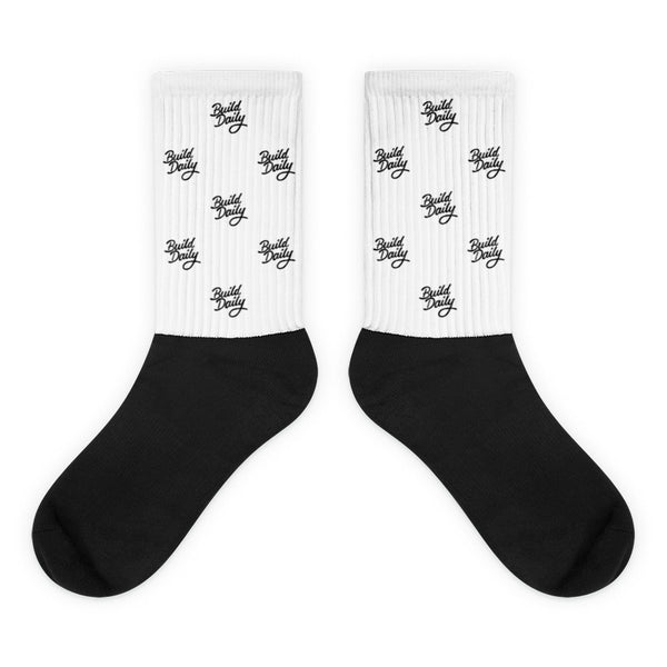 White and black socks with black build daily signature logo