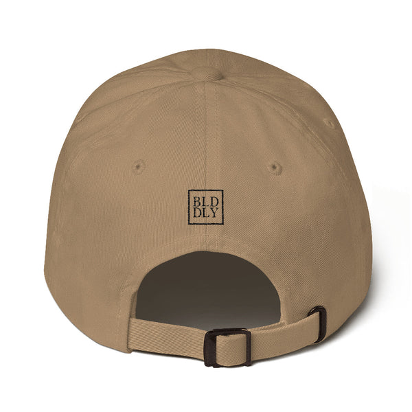 Back of khaki cap with black build daily monogram logo